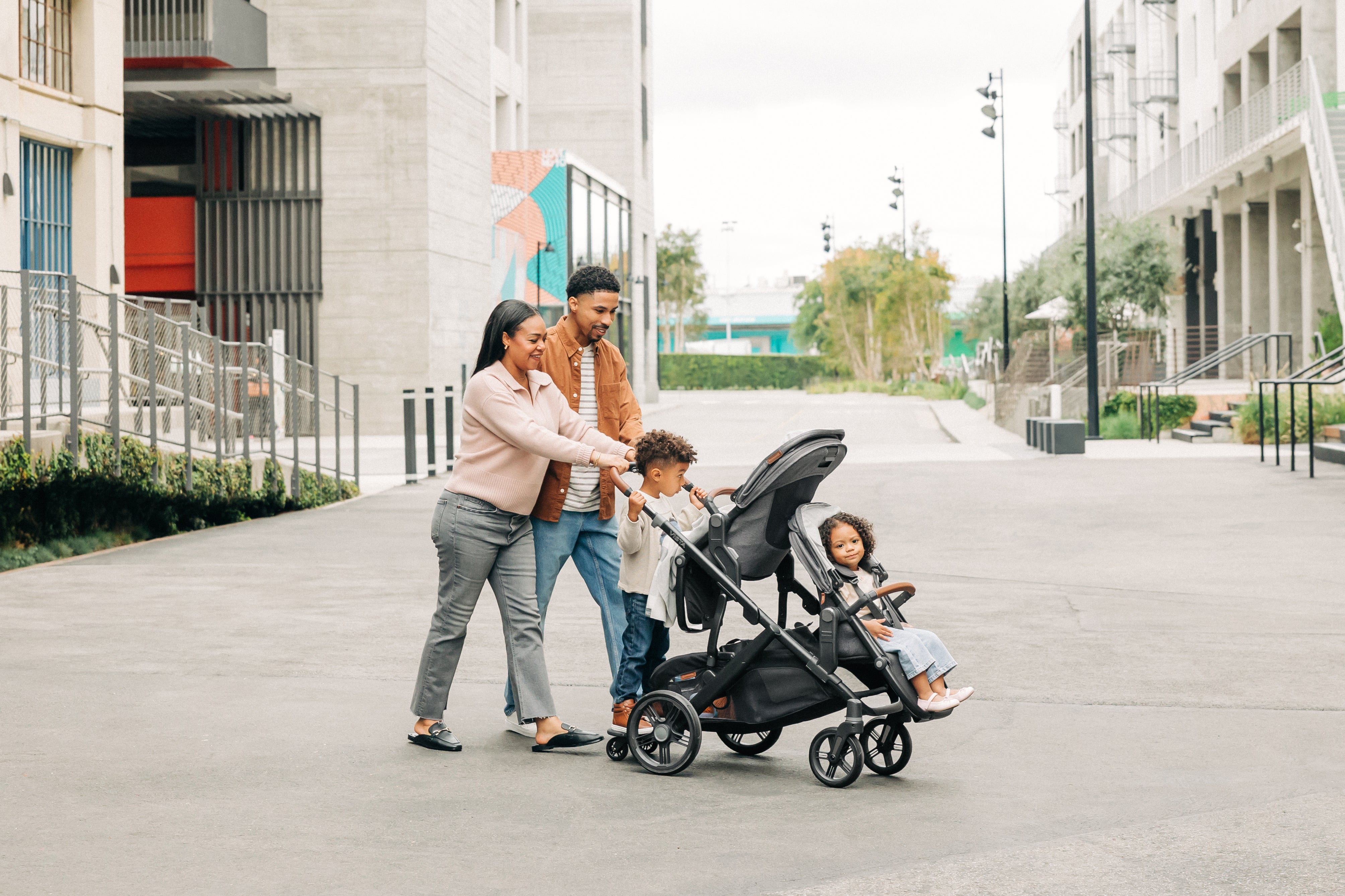 family and kids pushing a vista v3 baby stroller